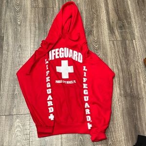 Size Medium Authentic Lifeguard Apparel. Brand new, never worn.